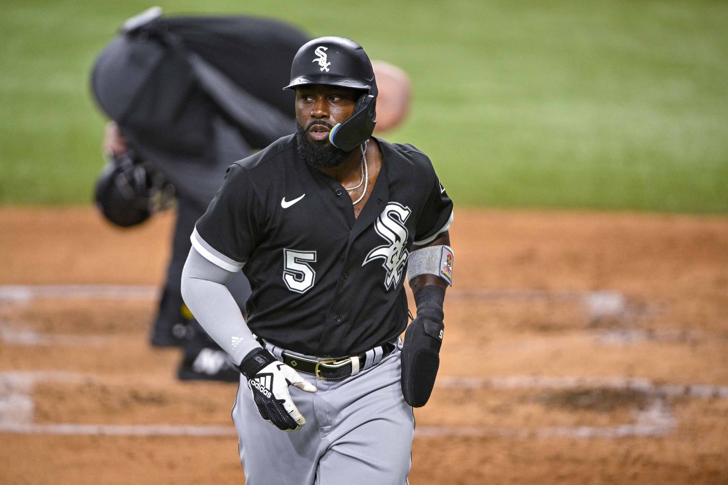 Chicago White Sox 2B Josh Harrison runs off field